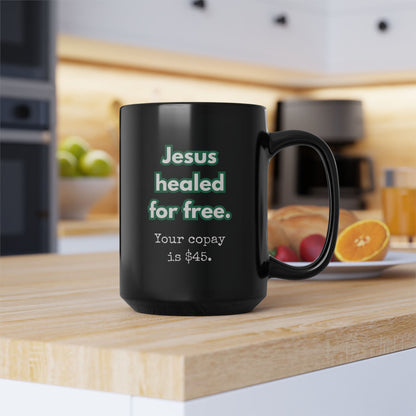 Black mug with text on a kitchen counter