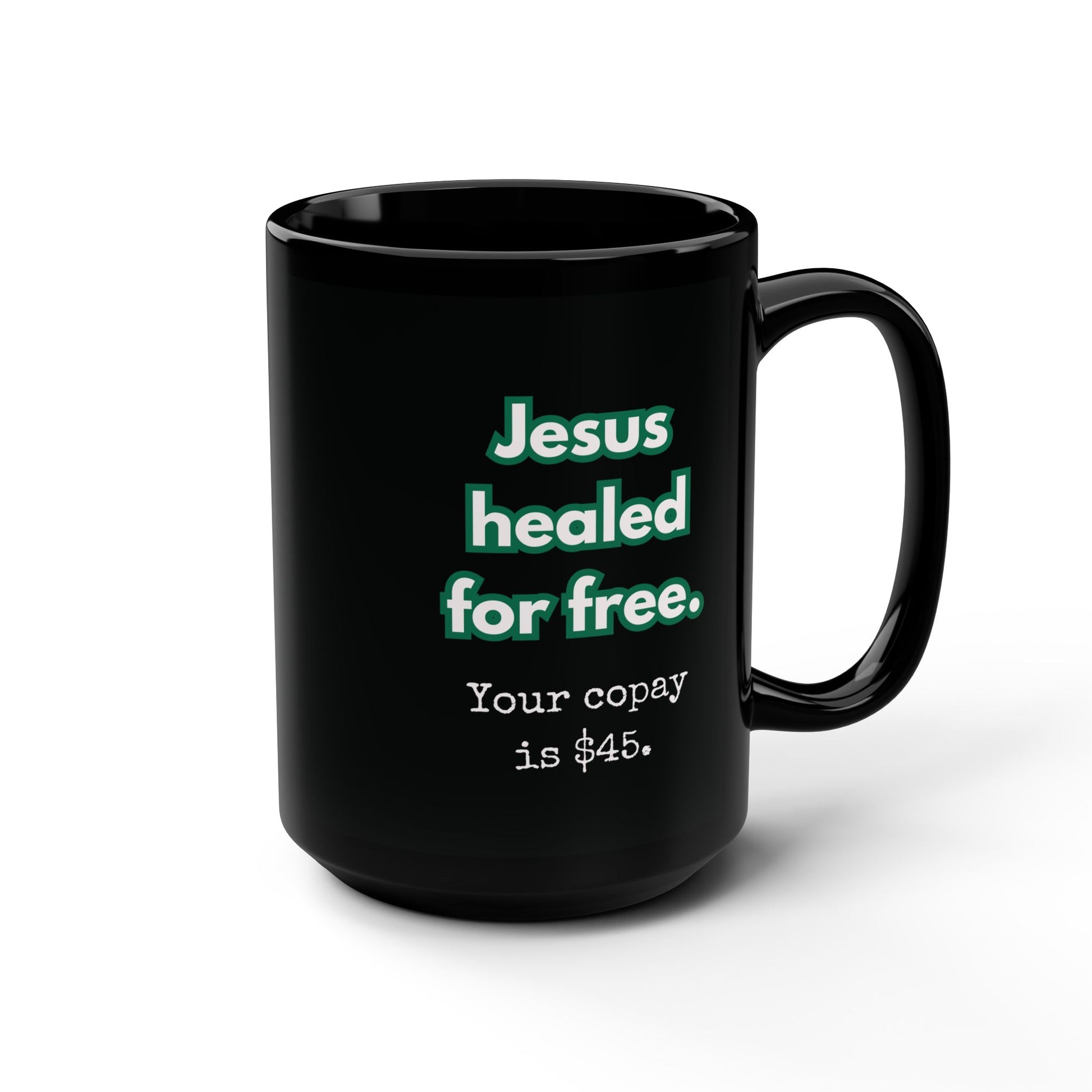 Black mug with humorous text design on a white background