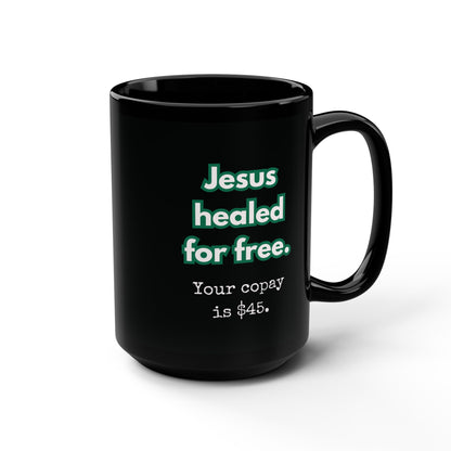 Black mug with humorous text design on a white background