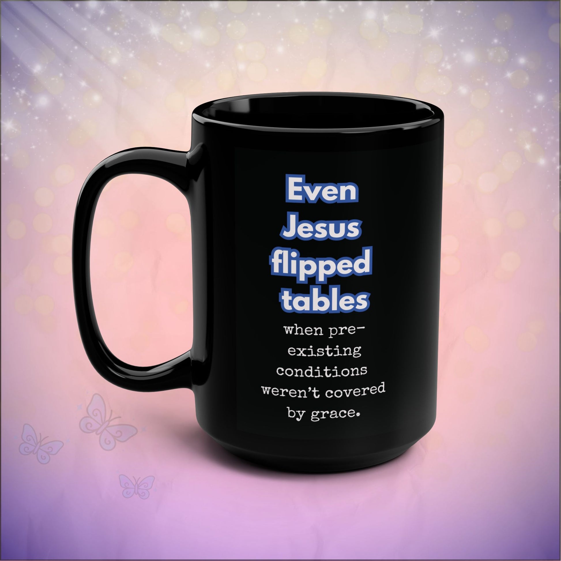 Black mug with humorous text on a blurred background