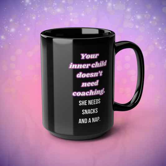 Black mug with humorous text on a pink and purple gradient background