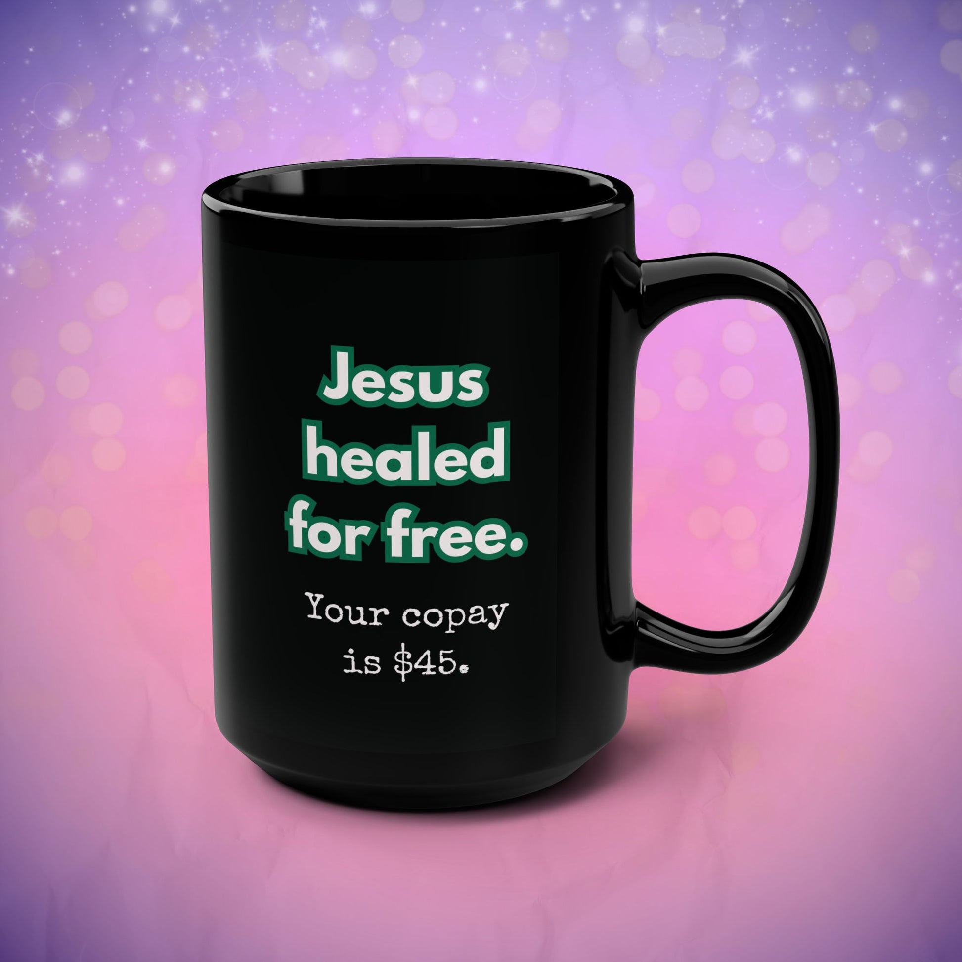 Black mug with text on a purple and pink gradient background