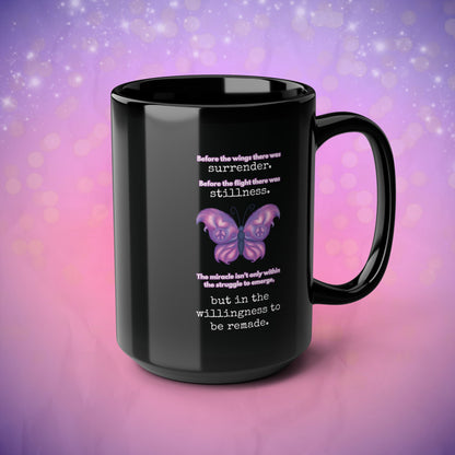 Black mug with butterfly design and motivational quote on a purple and pink gradient background