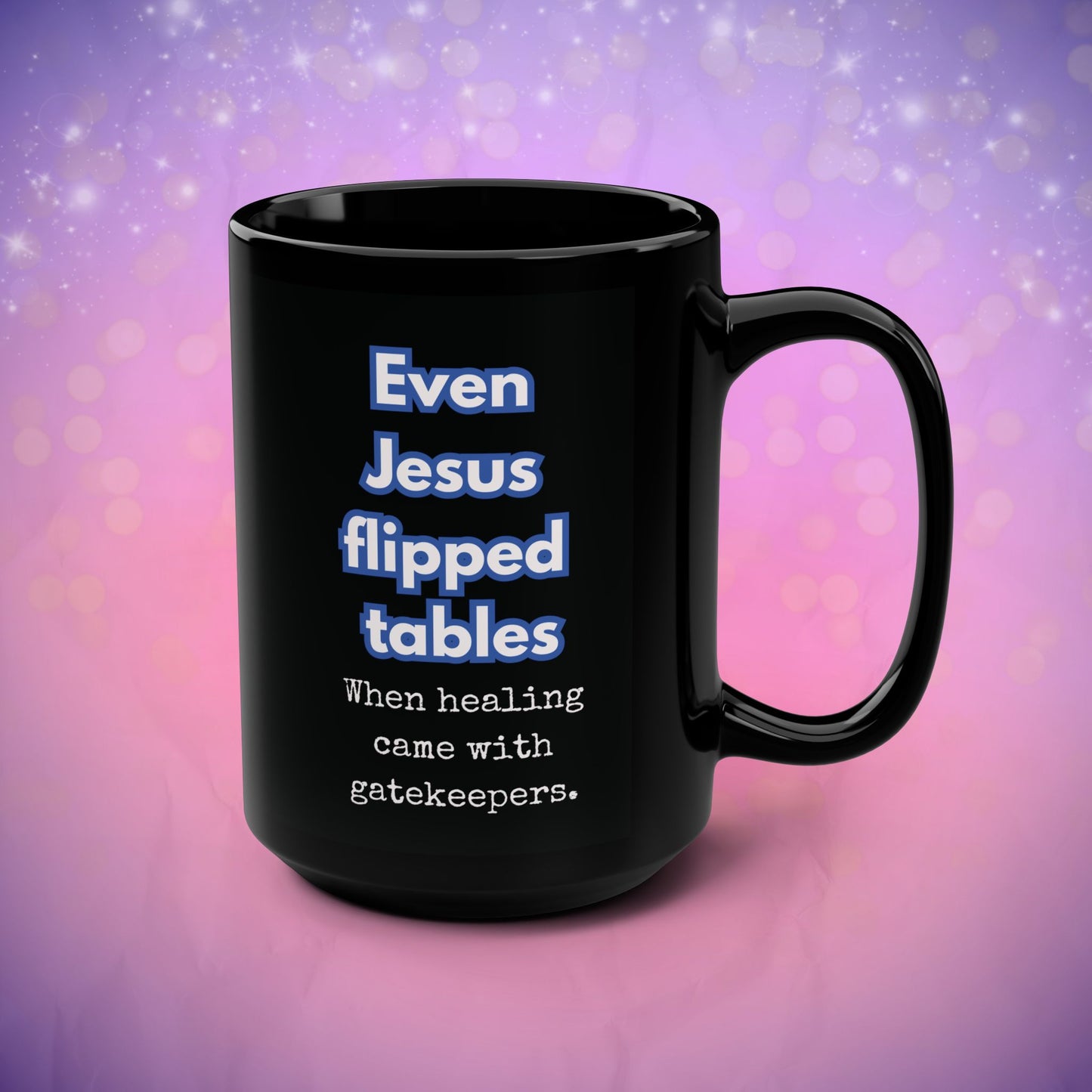 Black mug with humorous text on a gradient purple and pink background