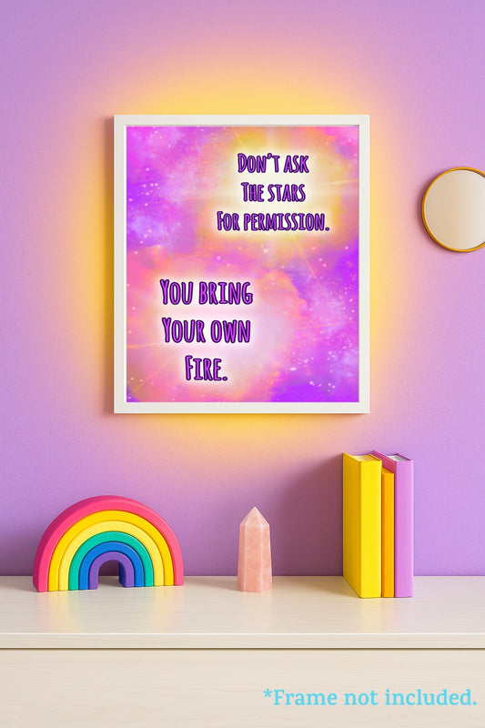Framed motivational quote reading “Don’t ask the stars for permission. You bring your own fire.” set against a cosmic pink-purple galaxy background with rainbow décor below; inspirational printable wall art by Imagination Creations.